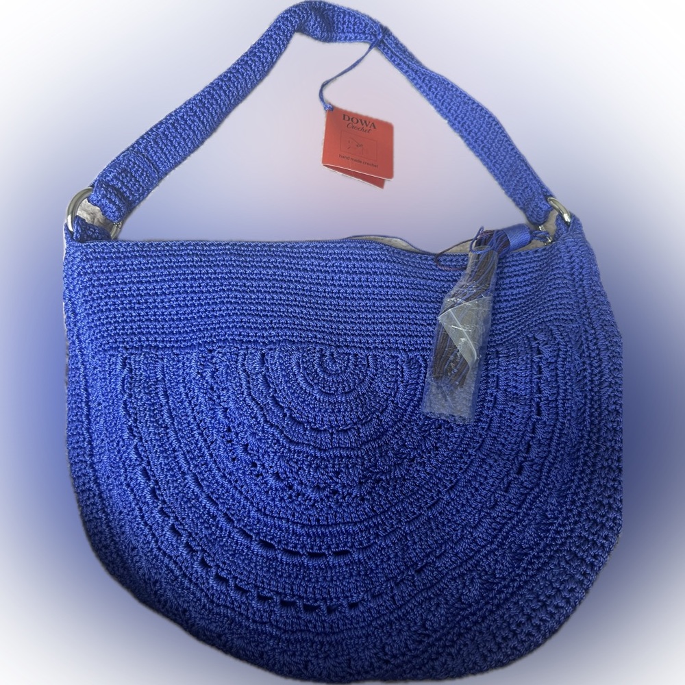 dowa brand Blue Crocheted Bag.Half Moon Shaped. New w/ Tags. Perfect For Spring!